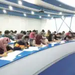 IHRA students writing notes during an HR training classroom session